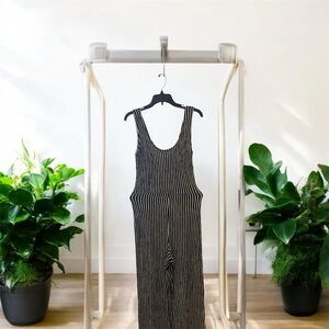 Black and white jumpsuit, used but in good condition still.